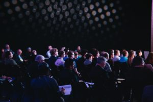Storytelling with content marketing conference in a dark room